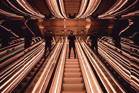 man in gray escalator thumbnail