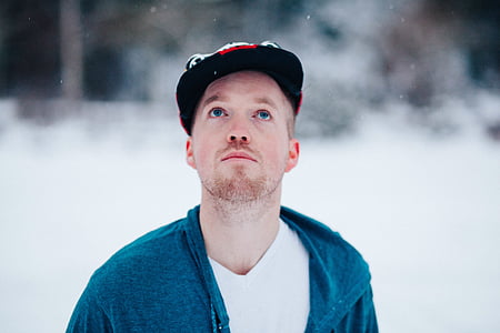man standing on snow field thumbnail