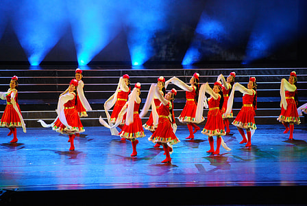 group of women dancing on stage thumbnail