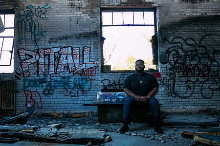 man sitting on chair thumbnail