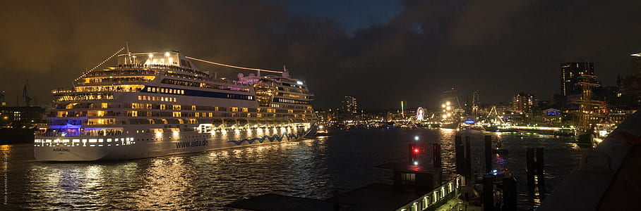 white cruise ship during night time thumbnail