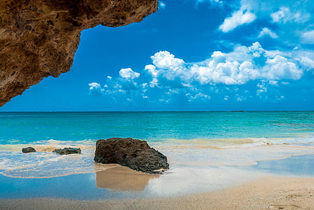 black rock on seashore thumbnail