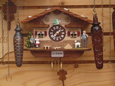 brown cuckoo clock on wall thumbnail