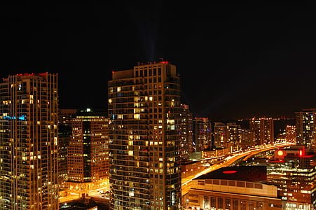 aerial photography of city buildings at nighttime thumbnail