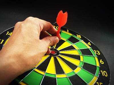 dart pin on dartboard bulls-eye thumbnail