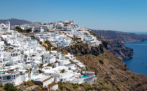 aerial photo of village on hilltop thumbnail