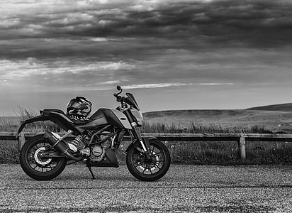 gray motorcycle on road thumbnail