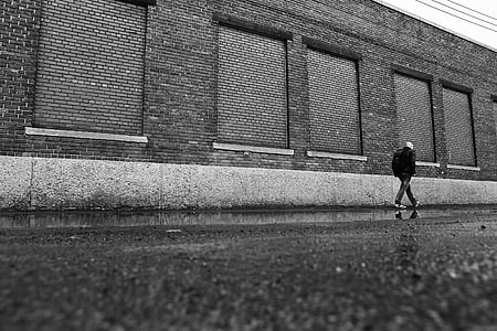 person wearing jacket in grayscale photorgraphy thumbnail