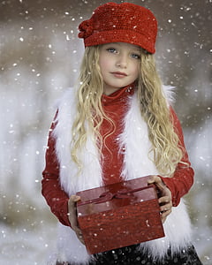 shallow focus photography of girl holding red box thumbnail