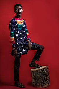 man in blue and black top thumbnail