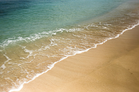 body of water across sea shore thumbnail