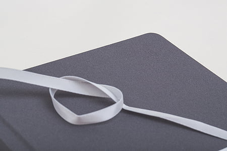 white lace on gray surface thumbnail