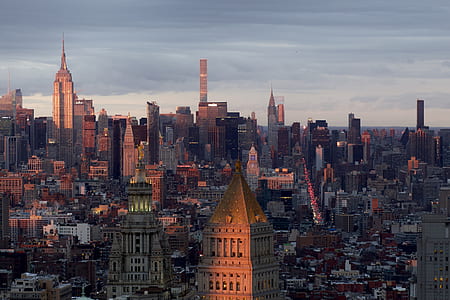 aerial photography of high rise buildings under blue sky thumbnail