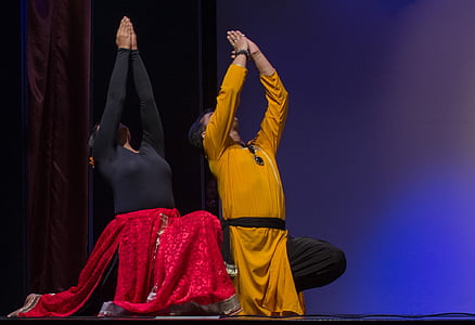 man and woman performing thumbnail