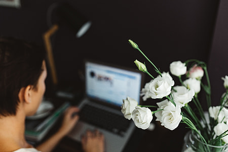 Woman working on laptop at home office thumbnail