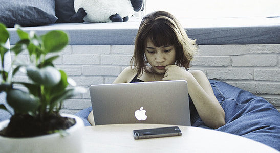 Woman on Beanbag using MacBook thumbnail
