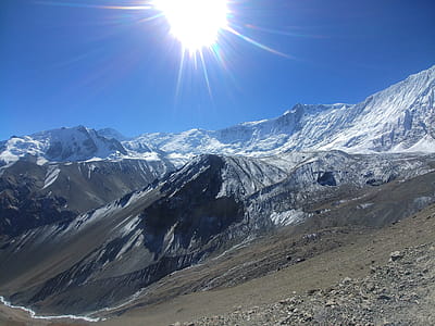 Looking into the sun in the Himalayan landscape. thumbnail