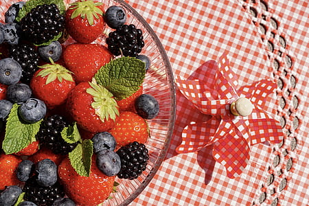 fruits inside glass bowl on top of table thumbnail
