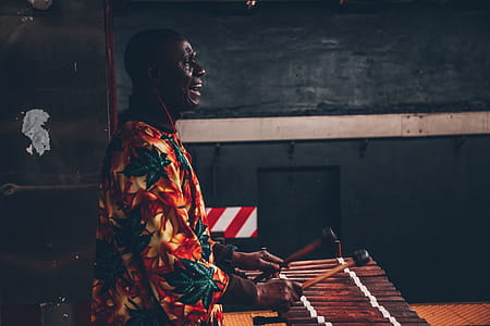 Man Playing Percussion Instrument thumbnail
