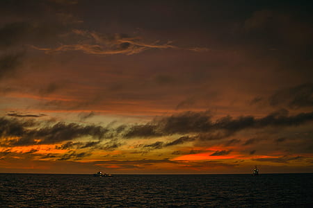 photo of ship on body of water thumbnail