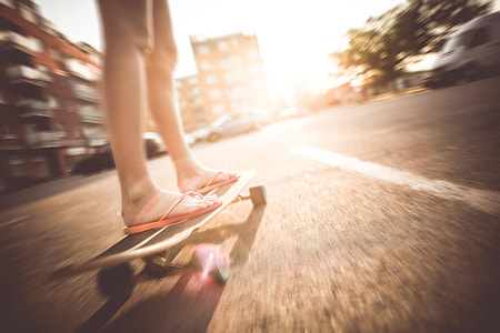 Crazy Girl Riding Her Longboard in Flip Flops thumbnail