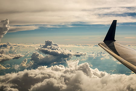 Clouds From Aircraft Window Photo thumbnail
