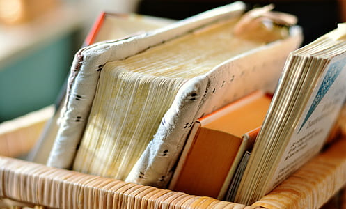 closeup photo of filed books in basket thumbnail