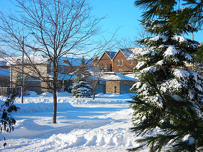 Residential condominiums and houses in Barrie after a snowfall in Barrie, Ontario, Canada thumbnail
