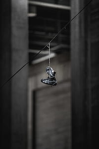 pair of gray-and-white running shoes thumbnail