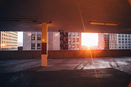 white concrete building during sunset thumbnail