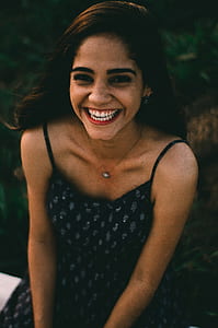 shallow focus photography of woman smiling thumbnail