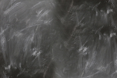 Blackboard and chalk in school classroom thumbnail