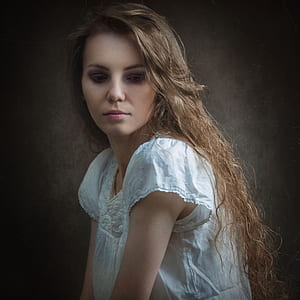 woman wearing white top thumbnail