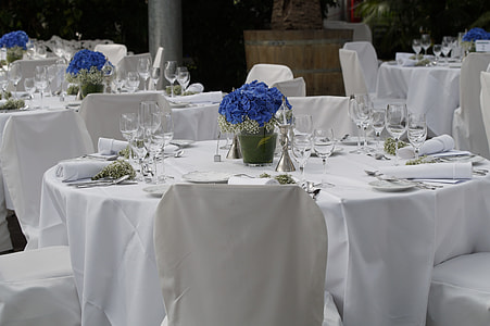 tables with glassware and dinnerware and tablecloth thumbnail