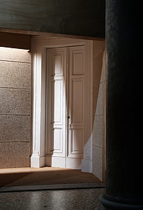closed white wooden 2-panel door thumbnail