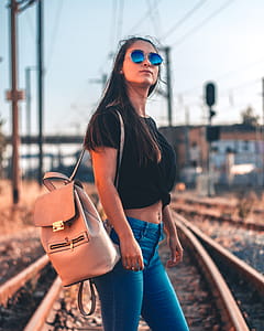 Woman Carrying Backpack thumbnail