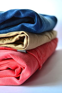 three denims on white surface thumbnail