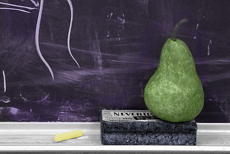 green fruit placed on black surface thumbnail