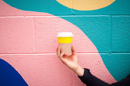 person wearing disposable cup thumbnail