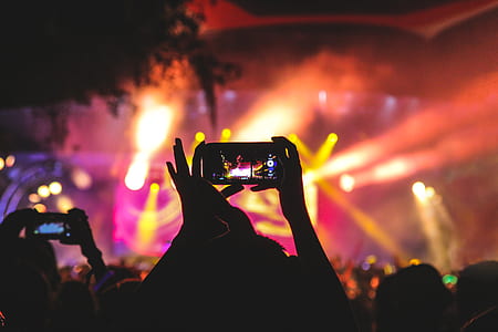 person holding smartphone showing disco lights thumbnail