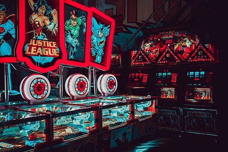 multicolored Justice League game arcades inside room thumbnail