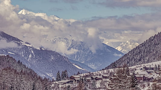 snow capped mountain during daytime thumbnail