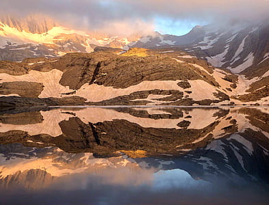 brown mountain with snow thumbnail