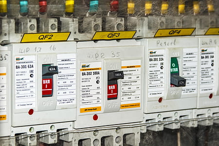 three white circuit breakers close-up phot thumbnail