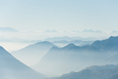 blue foggy mountain during daytime thumbnail