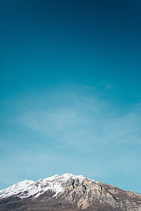 brown mountain during day tim thumbnail