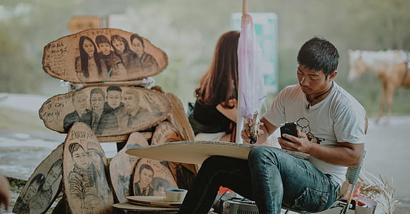 Man in White Shirt Painting thumbnail