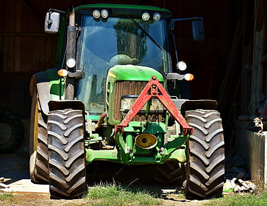 green tractor in garage thumbnail