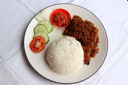 steamed rice, ground meat dish with tomato and cucumber slices in plate thumbnail