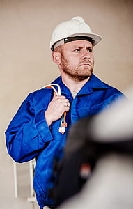 man carrying electric cable thumbnail